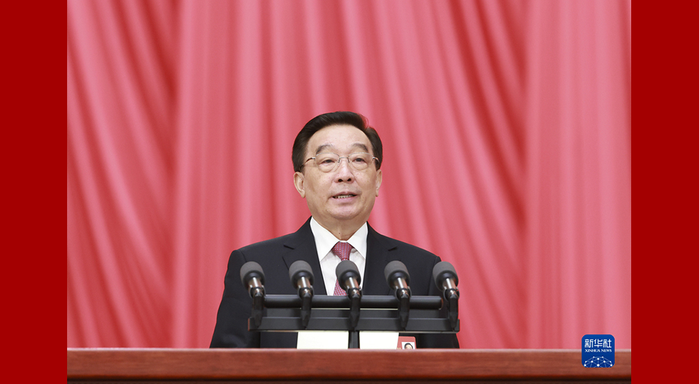 3月5日，第十四届全国人民代表大会第一次会议在北京人民大会堂开幕。王晨作关于立法法修正草案的说明。