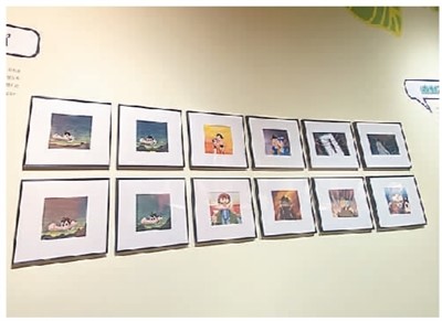 　《铁臂阿童木》动画创作于1963年。图为本次展览展出的本片的赛璐珞原片以及背景画。