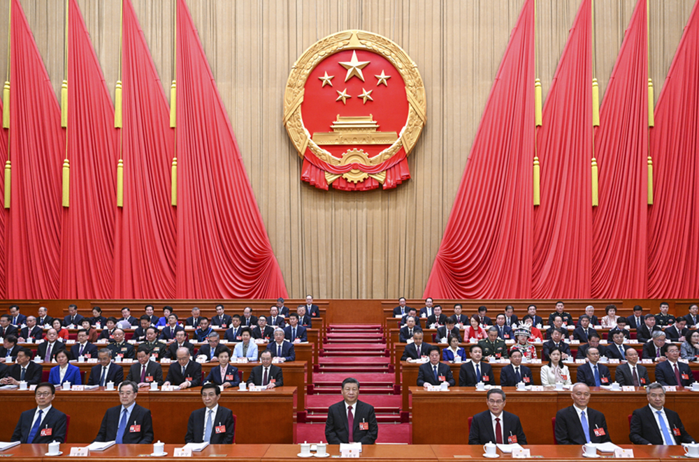 3月5日，第十四届全国人民代表大会第二次会议在北京人民大会堂开幕。党和国家领导人习近平、李强、王沪宁、蔡奇、丁薛祥、李希、韩正等出席大会。新华社记者 李学仁 摄