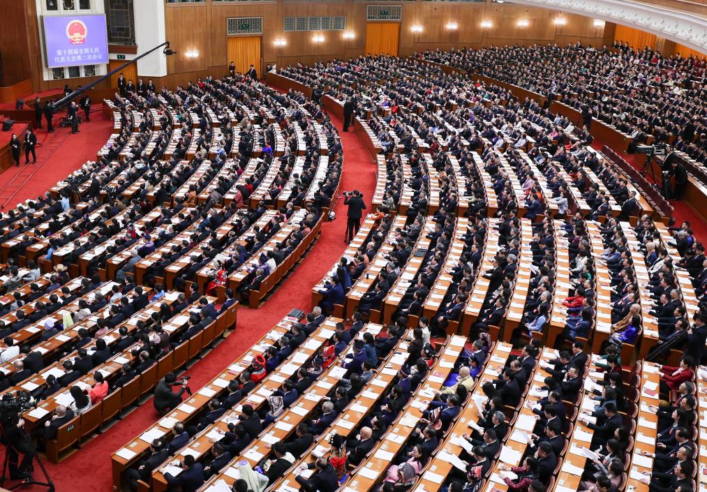 3月8日，十四届全国人大二次会议在北京人民大会堂举行第二次全体会议。新华社记者 刘续 摄