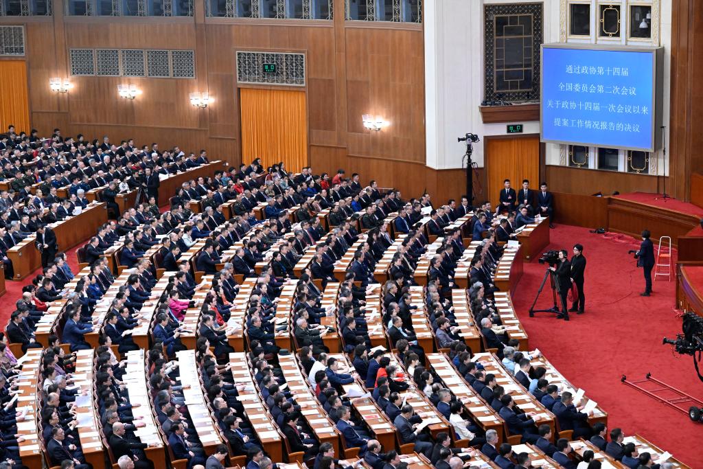 3月10日，中国人民政治协商会议第十四届全国委员会第二次会议在北京人民大会堂举行闭幕会。新华社记者 申宏 摄