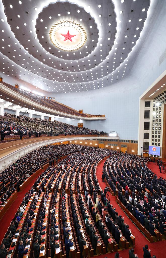 3月11日，第十四届全国人民代表大会第二次会议在北京人民大会堂举行闭幕会。新华社记者 丁林 摄