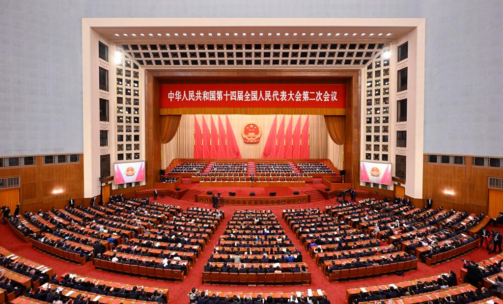 3月11日，第十四届全国人民代表大会第二次会议在北京人民大会堂举行闭幕会。新华社记者 申宏 摄