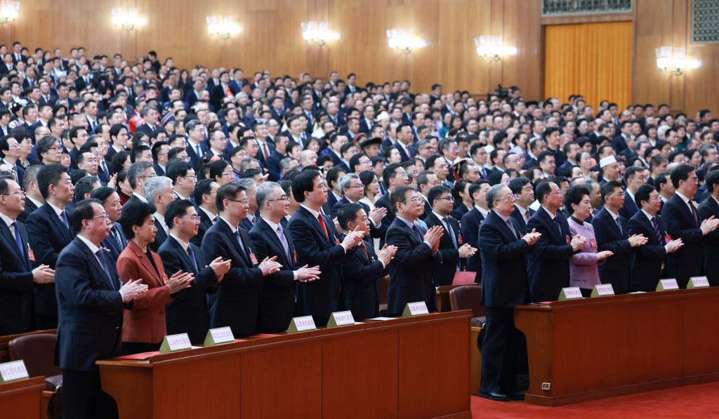 3月11日，第十四届全国人民代表大会第二次会议在北京人民大会堂举行闭幕会。新华社记者 王晔 摄
