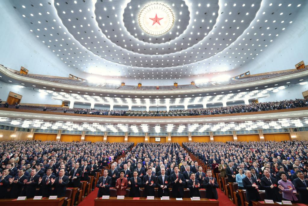 3月11日，第十四届全国人民代表大会第二次会议在北京人民大会堂举行闭幕会。新华社记者 黄敬文 摄