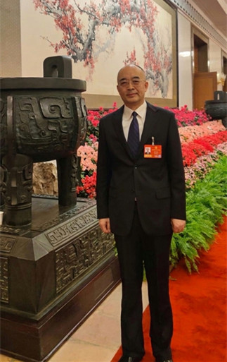 全国政协委员、中国作协副主席吴义勤