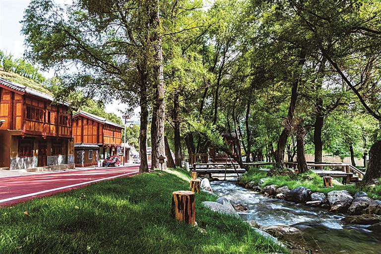 池沟村的建筑风格与山水融为一体。资料图片